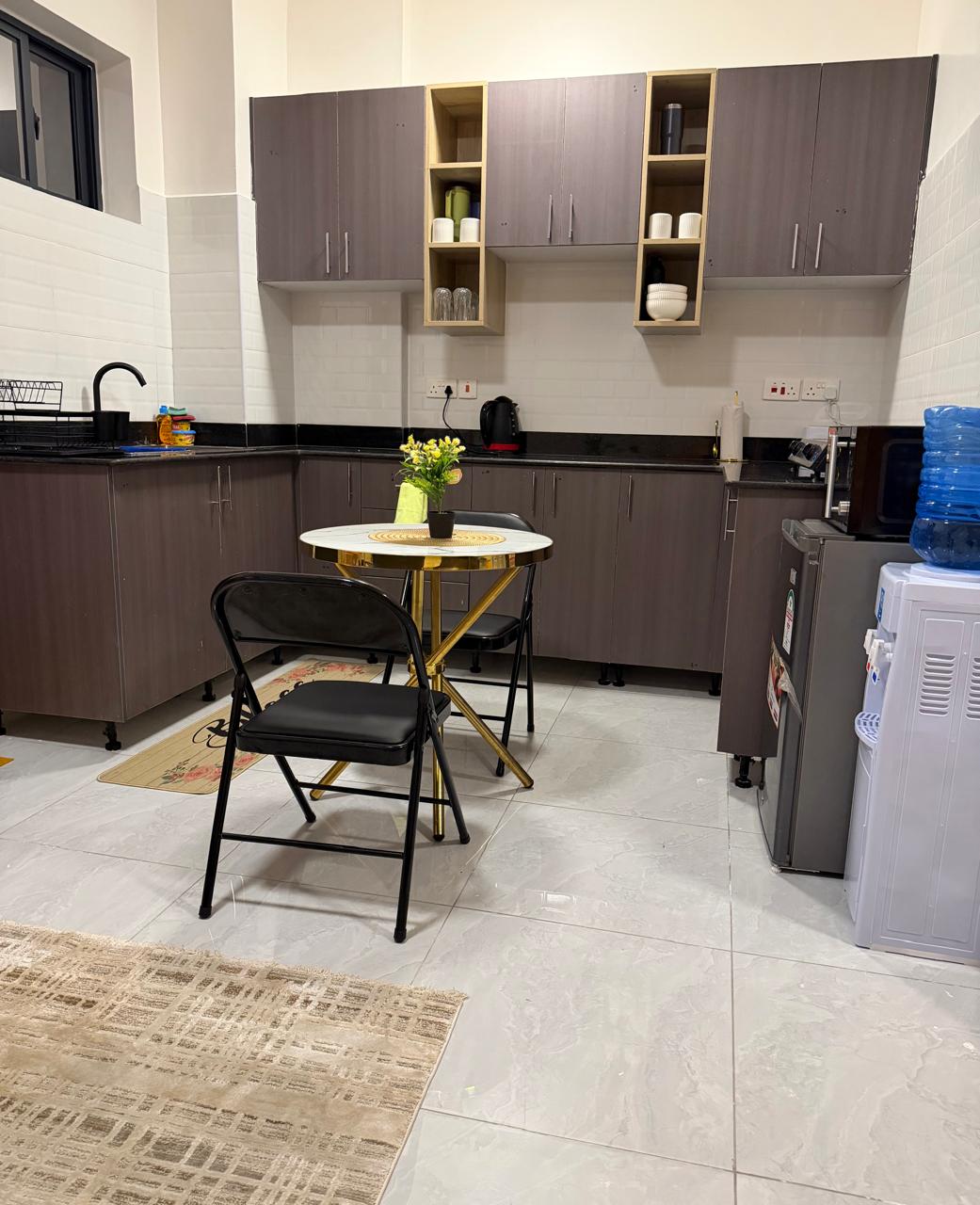 Fully fitted kitchen with dining table for two